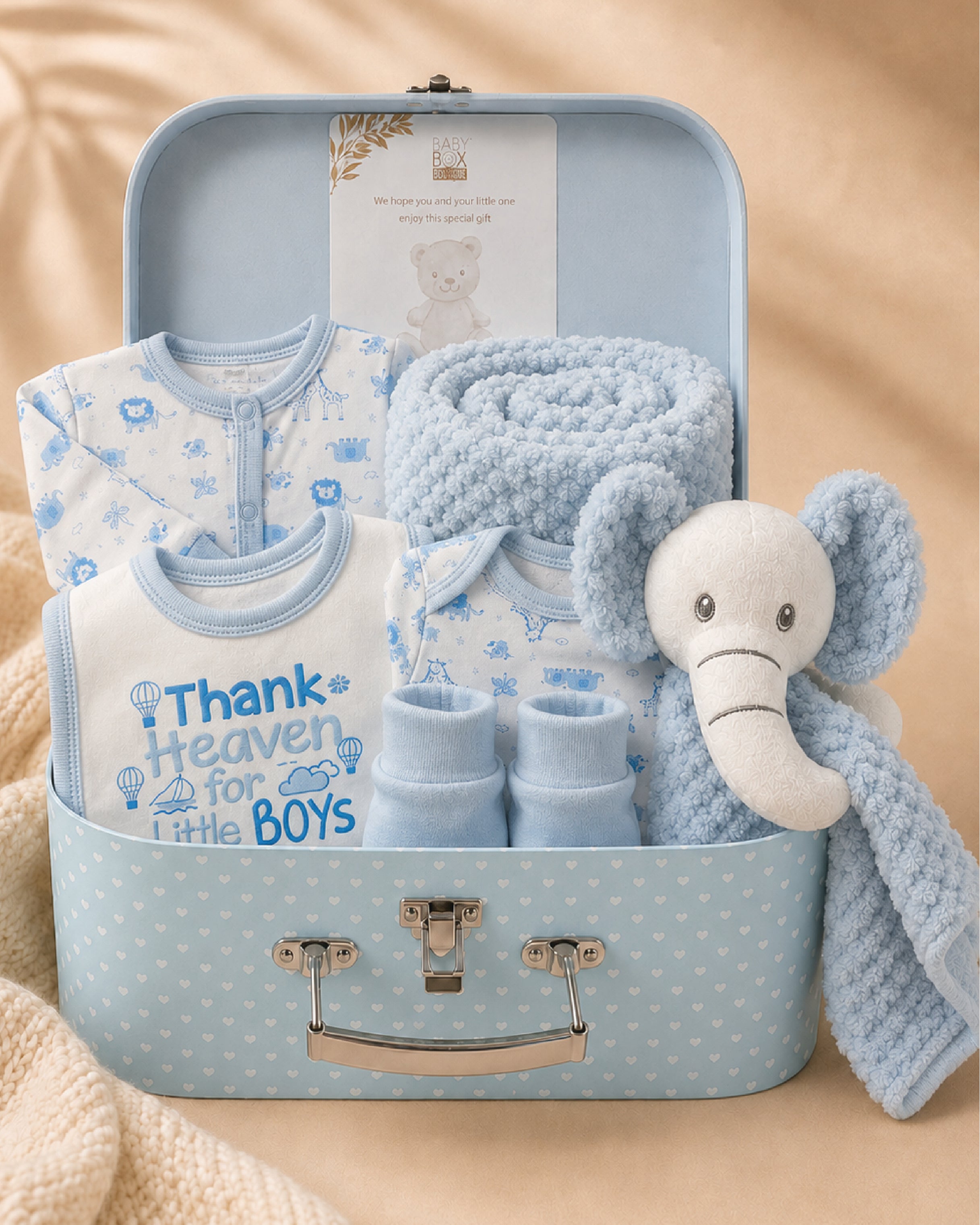 Blue , 9CL24-B , Hero Shot ,

Baby shower gift set in a blue keepsake case with sleepsuit, bodysuit, bib, mittens, elephant comforter and matching waffle blanket