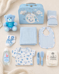 Blue , 9CM23-B , Contents Flat Lay ,

Every item laid out flat — bodysuit, bib, socks, muslin, washcloths, brush and comb, teddy bear, nappies and Johnson's bubble bath