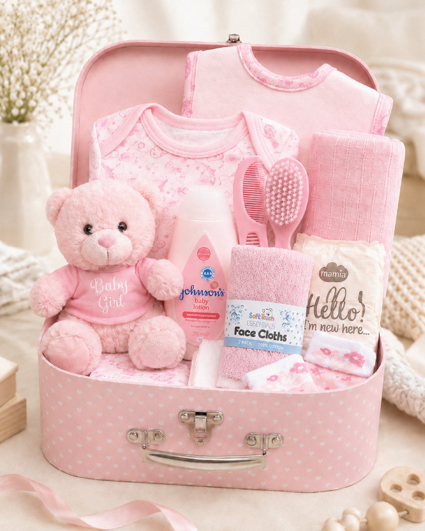 Pink , 9CM23-P , Hero Shot ,

Baby essentials gift set in a pink keepsake case with bodysuit, bib, socks, muslin, teddy bear and Johnson's baby lotion