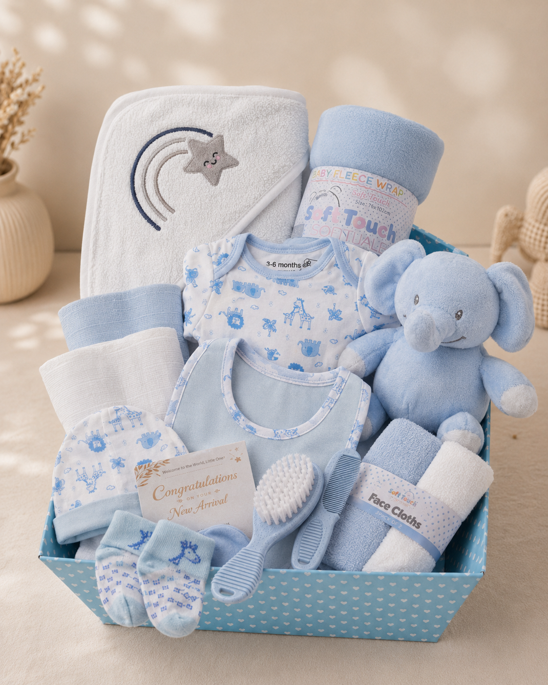 Blue - 9TR40-B - Baby gift hamper in a blue presentation tray with cotton bodysuit, bib, hat, mittens, hooded towel, muslins and a soft toy