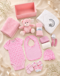 Pink , 9TR40-P , Contents Flat Lay ,

Every item from the hamper laid out flat — bear soft toy, fleece wrap, socks, bodysuit, white and pink muslins, brush and comb set, bib, white hooded towel and the pink box