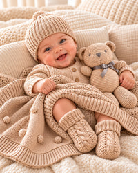 Biscuit , 9XB720-BI , Lifestyle Shot ,

Baby in the biscuit knitted cotton hat and bootees with the matching blanket and cotton teddy bear