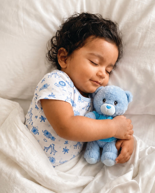 Blue , KEEL-B , Lifestyle Shot ,

Baby hugging the blue teddy bear soft toy