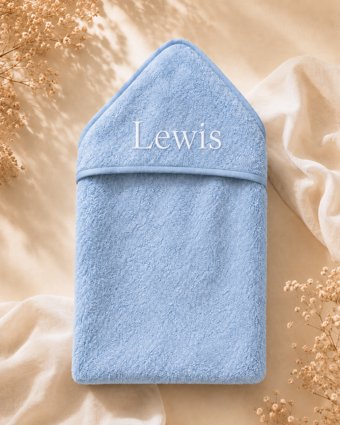 Blue - EMB - 9PZ51-B-EMB - Close-up of the blue hooded towel with embroidered personalisation