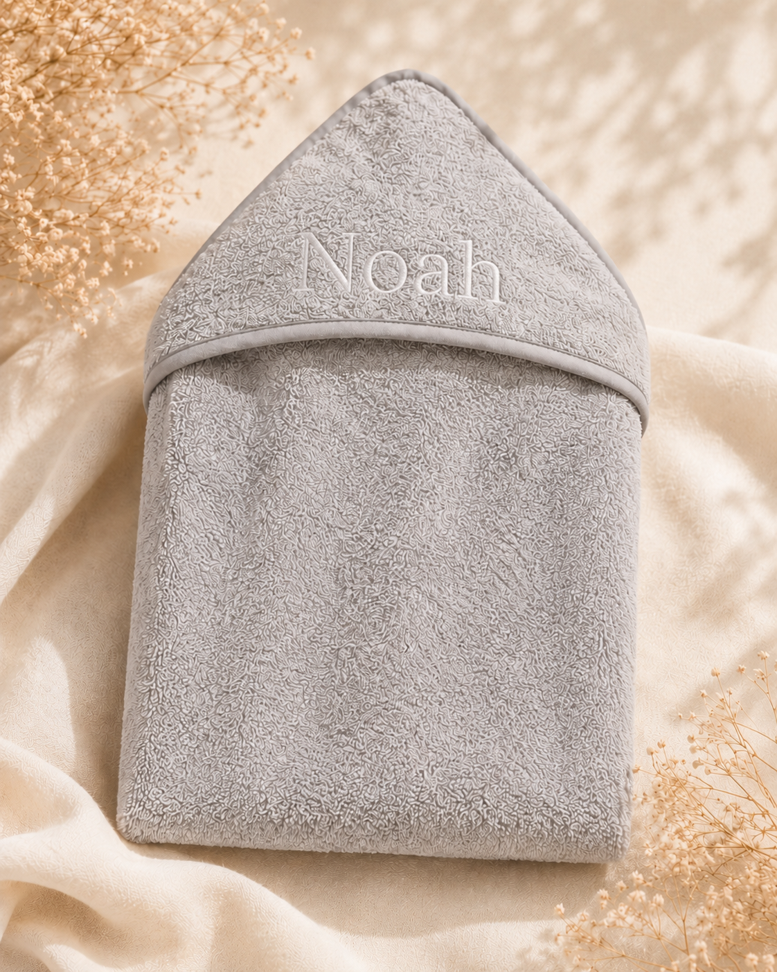 Grey - EMB - 9PZ51-G-EMB - Close-up of the grey hooded towel with embroidered personalisation