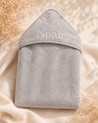 Grey - EMB - 9PZ51-G-EMB - Close-up of the grey hooded towel with embroidered personalisation