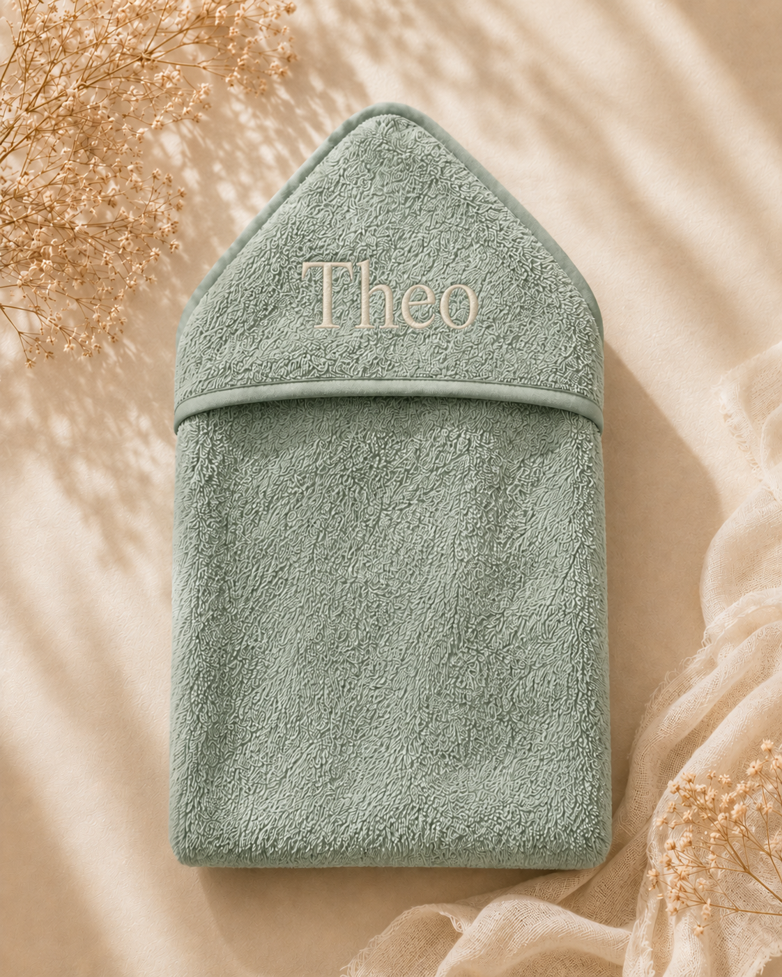 Sage Green - EMB - 9PZ51-SG-EMB - Close-up of the sage green hooded towel with embroidered personalisation